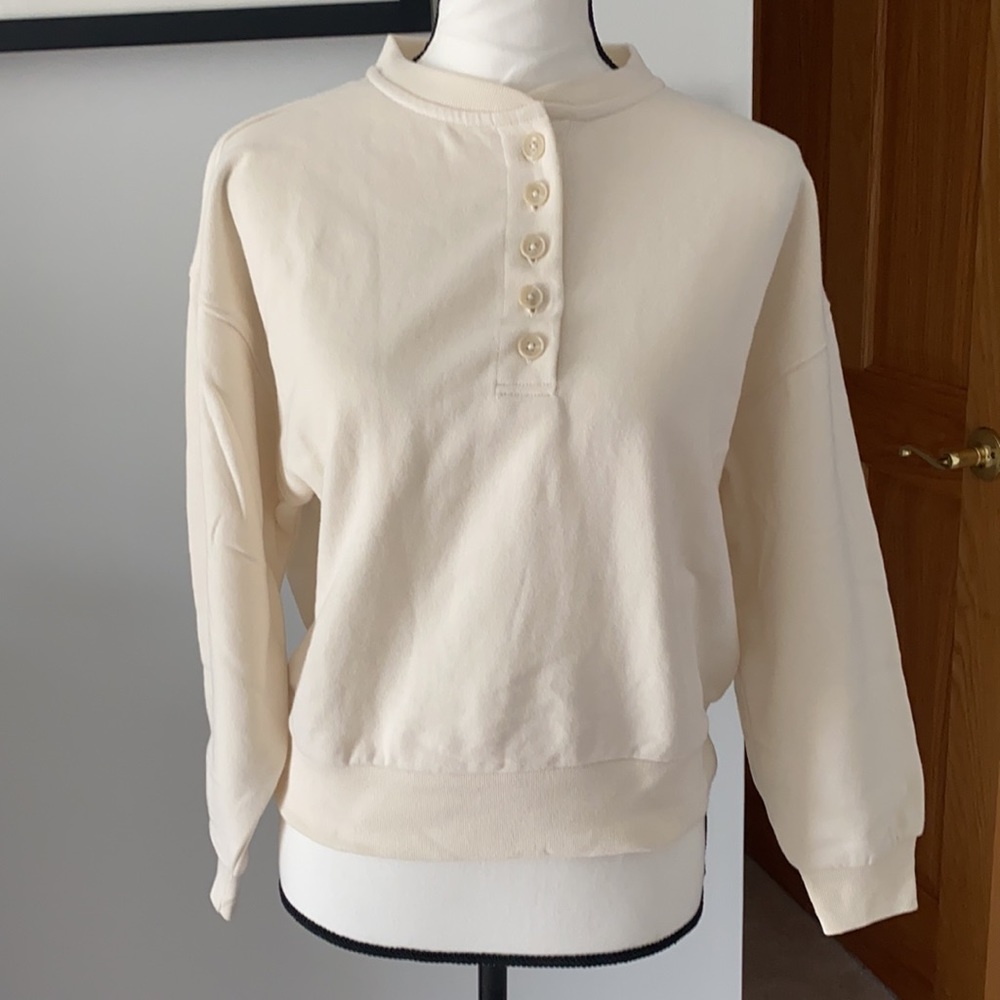 3/4” sleeve sweatshirt.